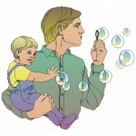 Blowing bubbles father and baby